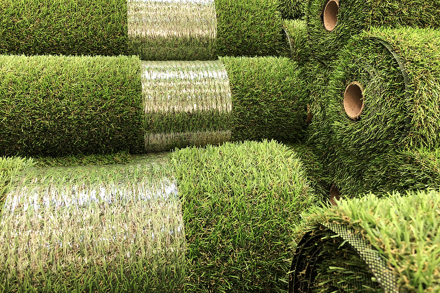 a pile of rolled artificial grass